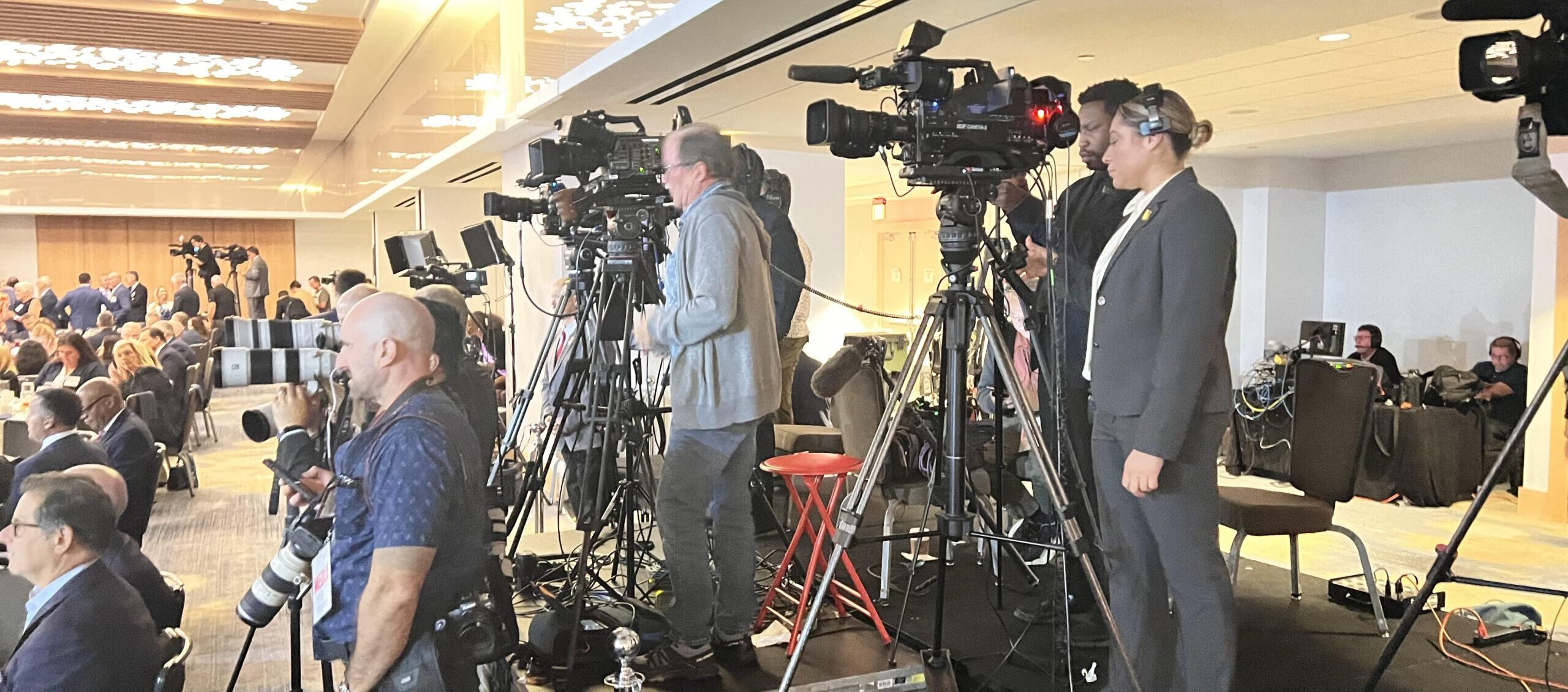 the FirstHand Production crew behind the scenes at a conference
